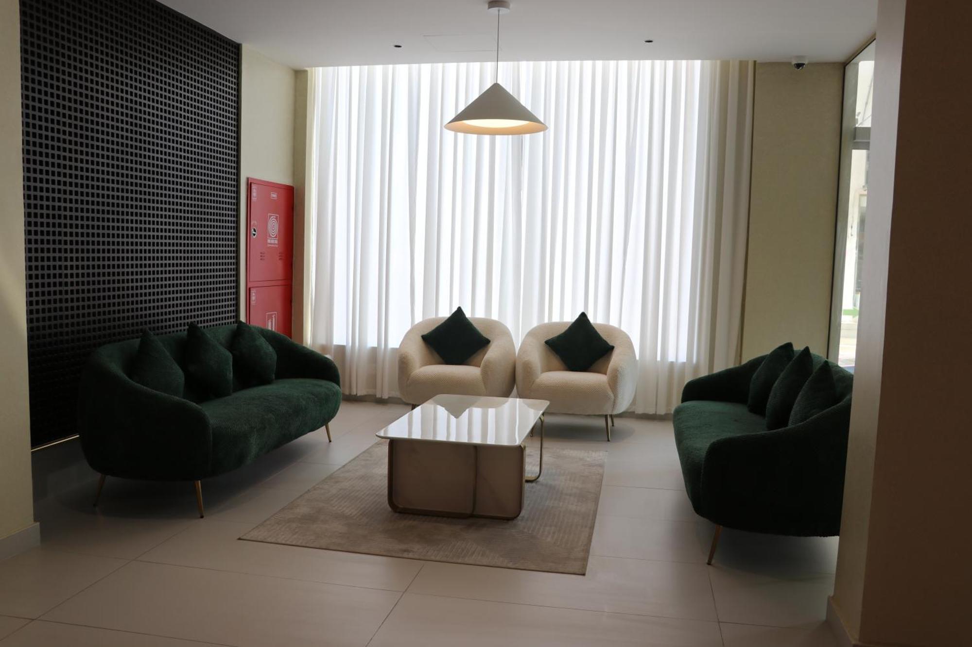 Jarzez Hotel Apartments Al Hail 锡卜 外观 照片
